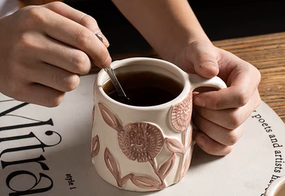 Drinking Beverage From Cup With Blush Pink Flower Blooms A Ceramic Mug With Organic Retro Craft Style