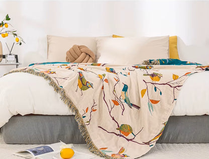 Colorful Birds On Reversible Cotton Blanket Draping On Bed In Modern Bedroom